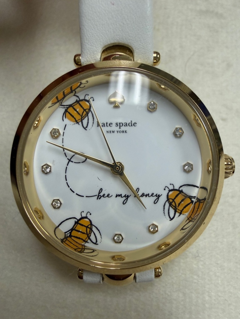 kate spade White and Gold Bee Motif Watch